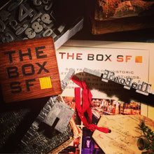 Load image into Gallery viewer, a closeup shot of presroom & mercantile at the box sf gift card